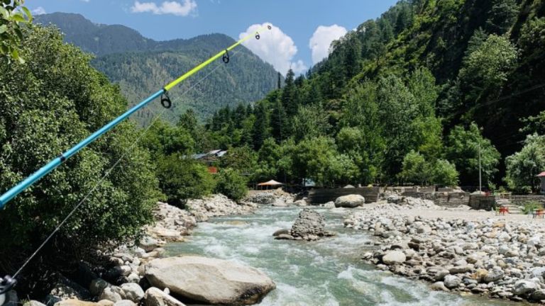Fishing in the Tirthan River